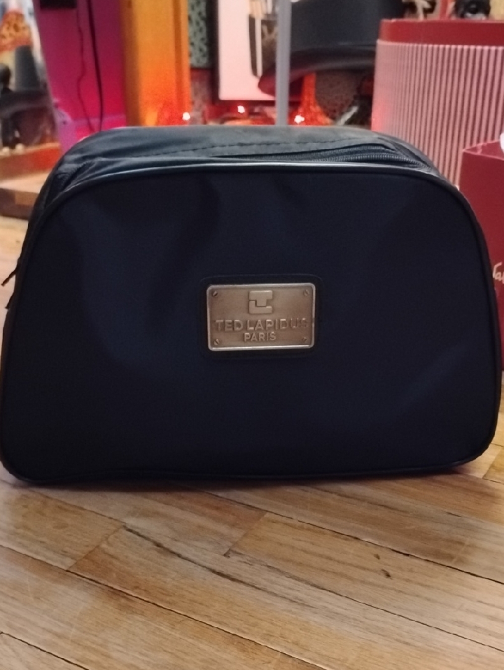 Lapidus Paris black nylon toiletry bag.